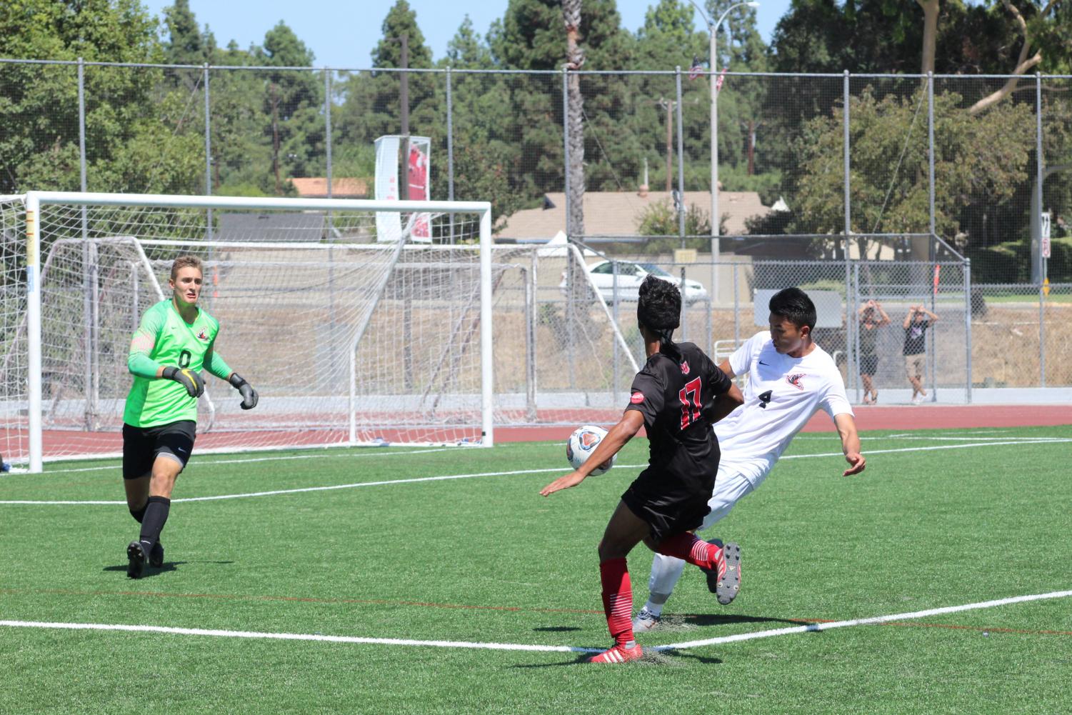 Sophomore midfielder Oscar Rubalcava attempts to score against the opposing team. 