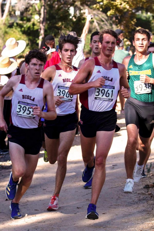 Biola mens Cross Country athletes make their way to the finish line. 