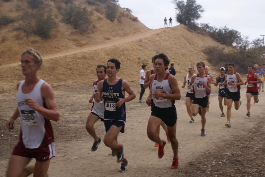 Men of the Biola Cross Country team race their way to the finish line.
