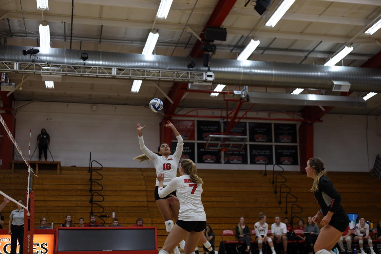 Junior Vanessa Garcia jumps towards the ball in order to pass towards her teammate. 