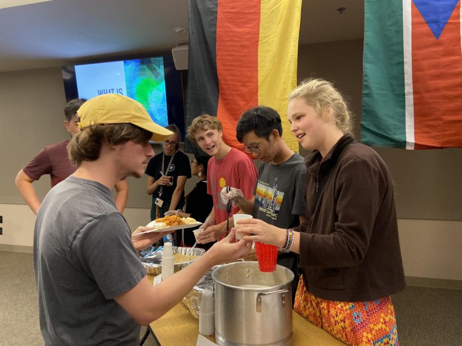 Students receive a variety of ethnic foods at GSPD's meet the neighbor event.