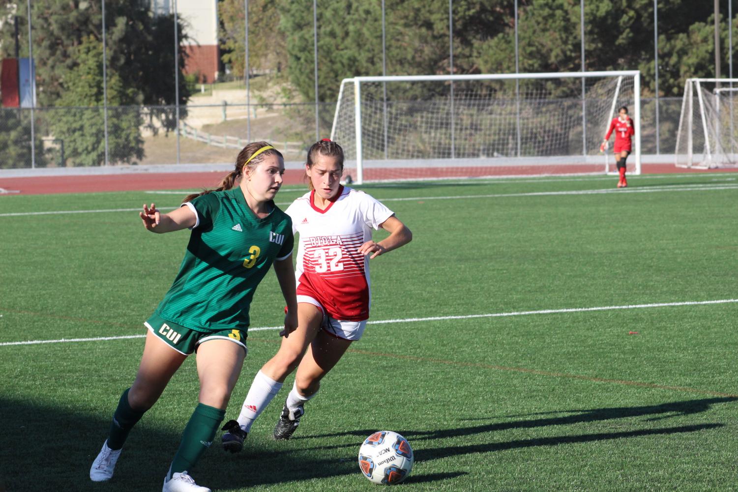 Freshman defender Madi Reeves moves in, in attempt to take the ball from her opponent.  During the October 2, 2019 match against Concordia University Irvine.  