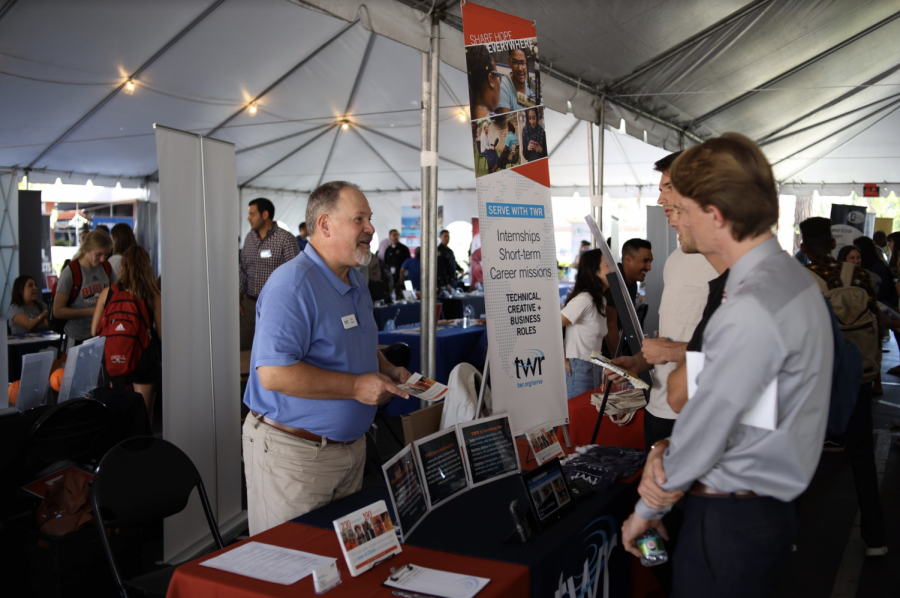 Students look at a variety of booths for jobs and internships at the 2019 Biola Career Expo. 