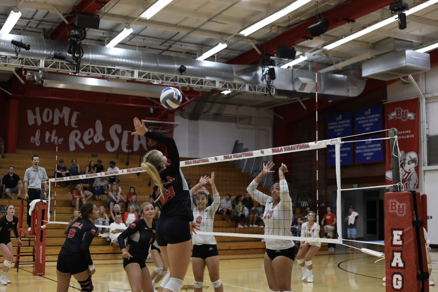 Freshman Abby Brewster goes in for the spike. 