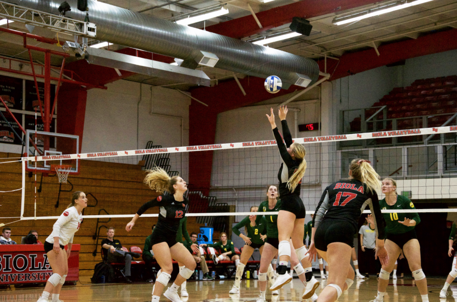 Biolas volleyball team goes in for a strike. 