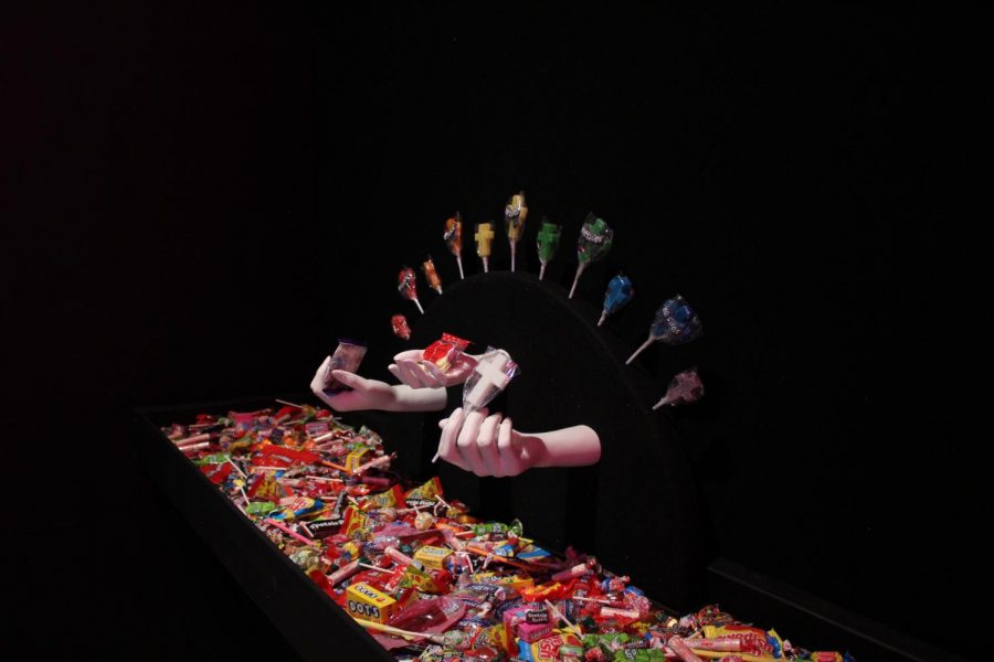 The museum features a colorful candy shop titled Sweet Jesus.