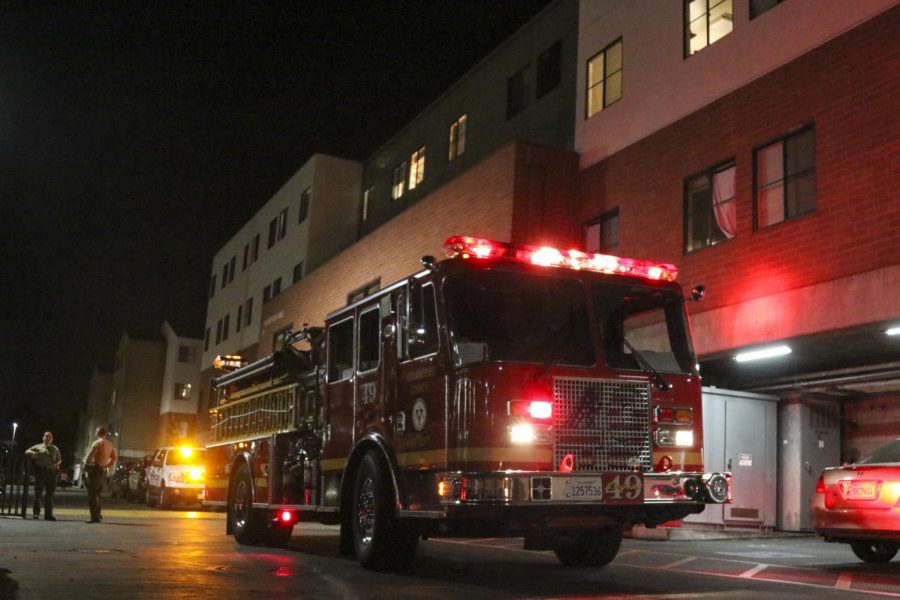 Campus security evacuates students from Thompson Hall after an electrical malfunction. 