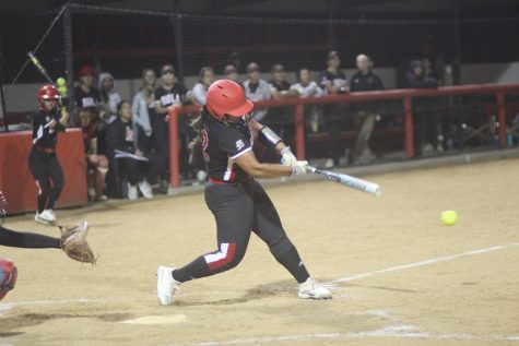 Softball squeezes by in back-to-back victories