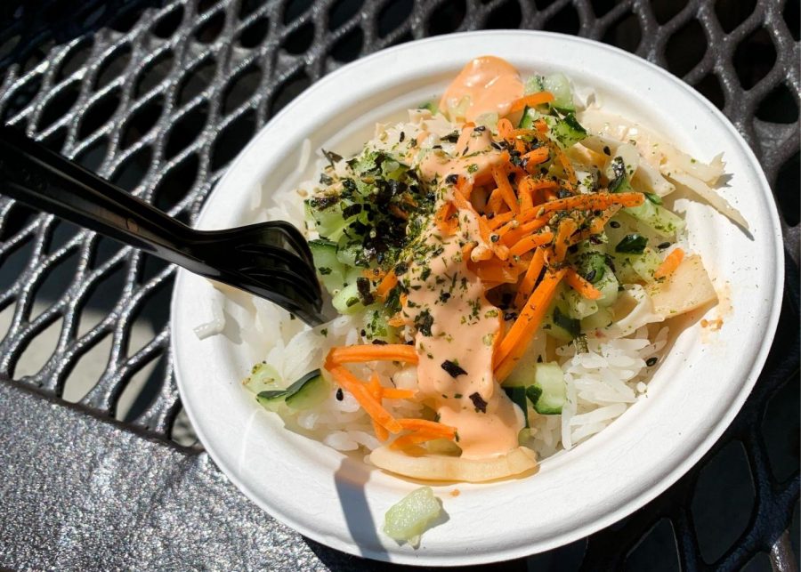 A vegan poke bowl from the Caf, which includes sushi rice, vegan crab meat, coconut meat and other toppings and sauces. 