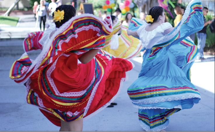 Fiesta+Latina+celebrates+Hispanic+culture+through+song+and+dance.+