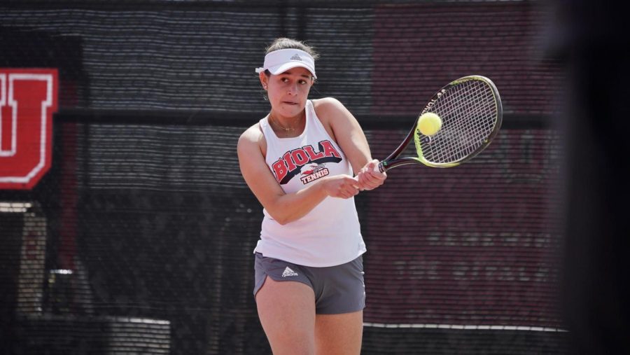 Junior Gaby Carvajal connects with the ball on a forehand shot. 