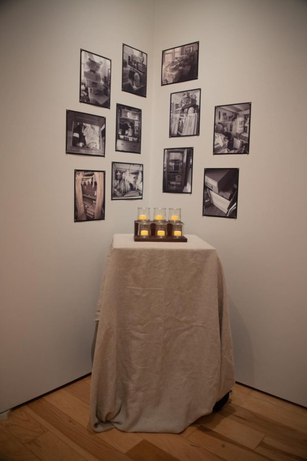 A corner wall of photographs depicts the art supplies stored in Tuttles home. 