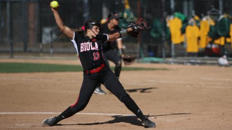 Redshirt junior pitcher and outfielder Raylene Roybal winds up for the pitch. 