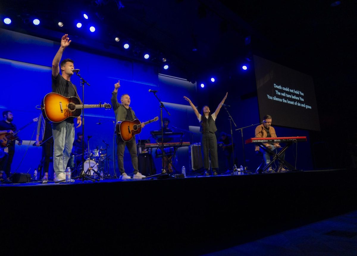 Worship band sing praises up on stage