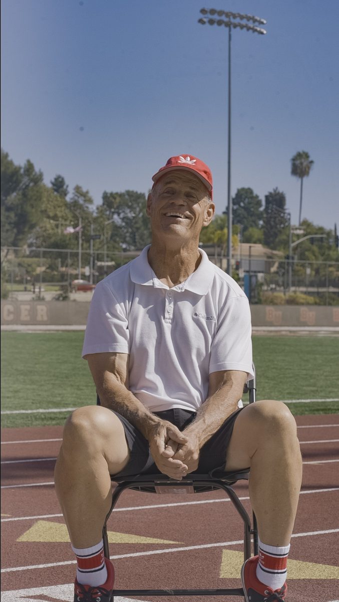 Daniel O’Keefe “Uncle Dan” in front of Biola’s soccer field 