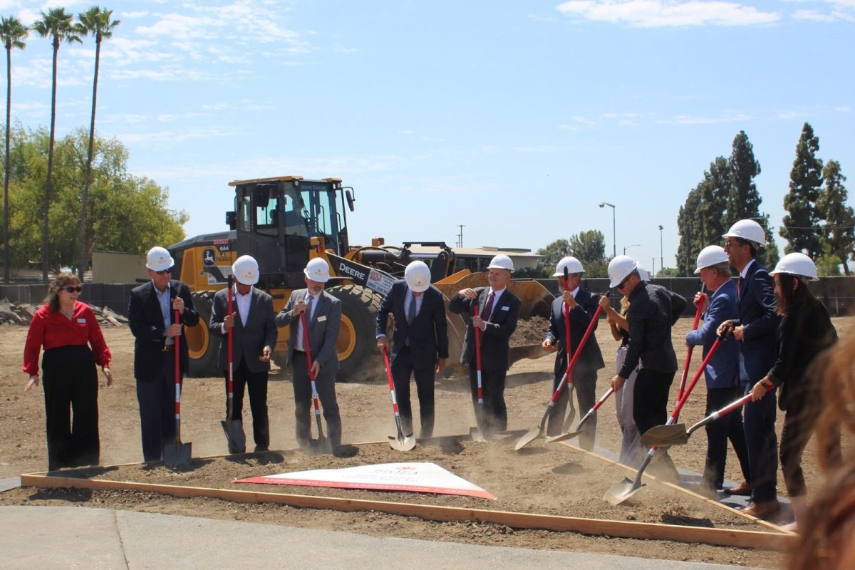 Biola leaders and special guests break ground for the new Snyder School of Cinema & Media Arts building in September 2024. Pictured from left to right: Jacqueline McCauslin, Brad Cole, Curtis Baker, Brian Phillips, Matthew Hall, Tom Halleen, Barry H. Corey, Lynsi Snyder-Ellingson, Sean Ellingson, Mike Maples, David Vazquez, and Susan Ishii.