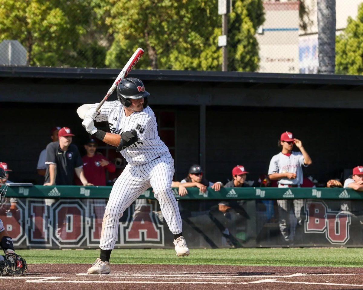 Samuel Lisiak hits a home run against Westmont March 19, 2025