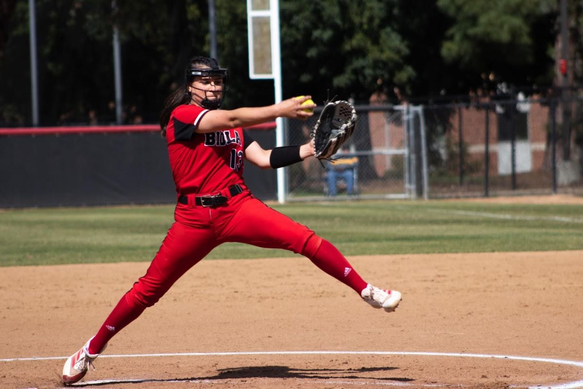 Raquel Reyes on the mound at Biola Softball game.