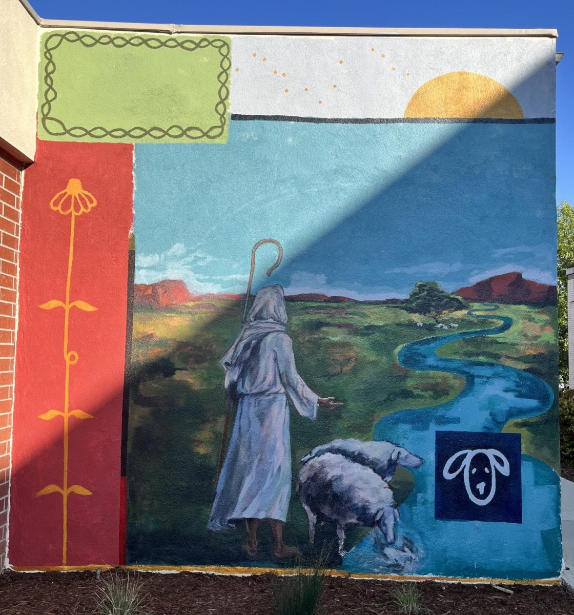 The new mural behind Marshburn building that will be painted over after graduation