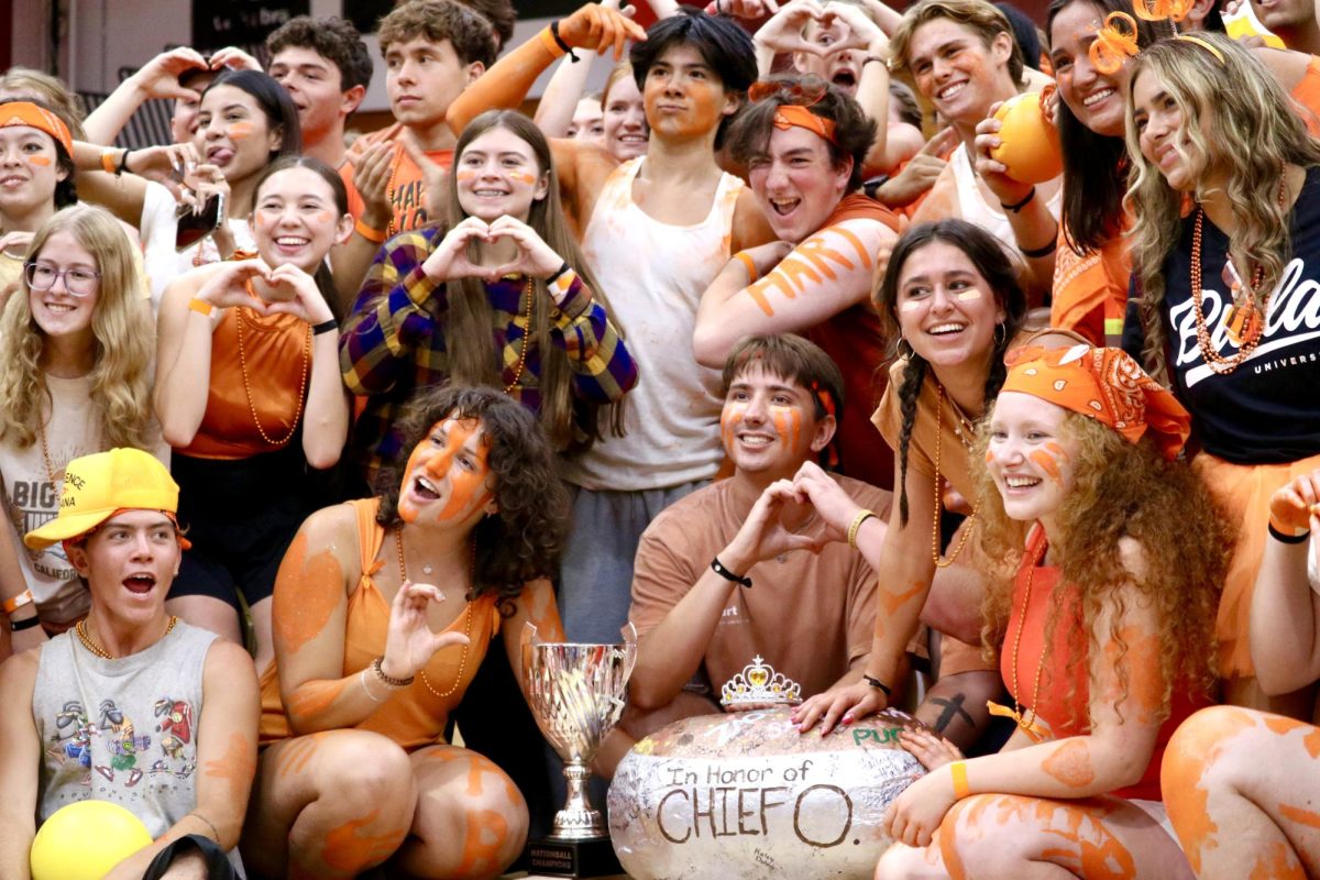 Hart Hall poses with their trophy and the Biola Egg.